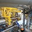 Reinach'taki Endress+Hauser Flow fabrikasında bulunan hidrokarbon akış kalibrasyon rigindeki yüksek hassasiyetli piston